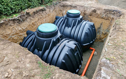 Two septic tanks in the ground.
